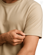 LUUM CoreForm Beige Regular Fit T-Shirt - A 180 GSM All SUPIMA Cotton Marvel. Worn by a Model displaying SUPIMA's superior stretch qualities