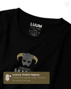 Closeup of gold-printed Skyrim runes and warrior design on premium Supima cotton. Part of DailyPrints Collection. Belief. Woven and Worn.