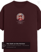 Close-up of the maroon Luffy t-shirt front, with stained-glass portrait and LUUM ethos print detail. Part of DailyPrints Collection. Belief. Woven and Worn.