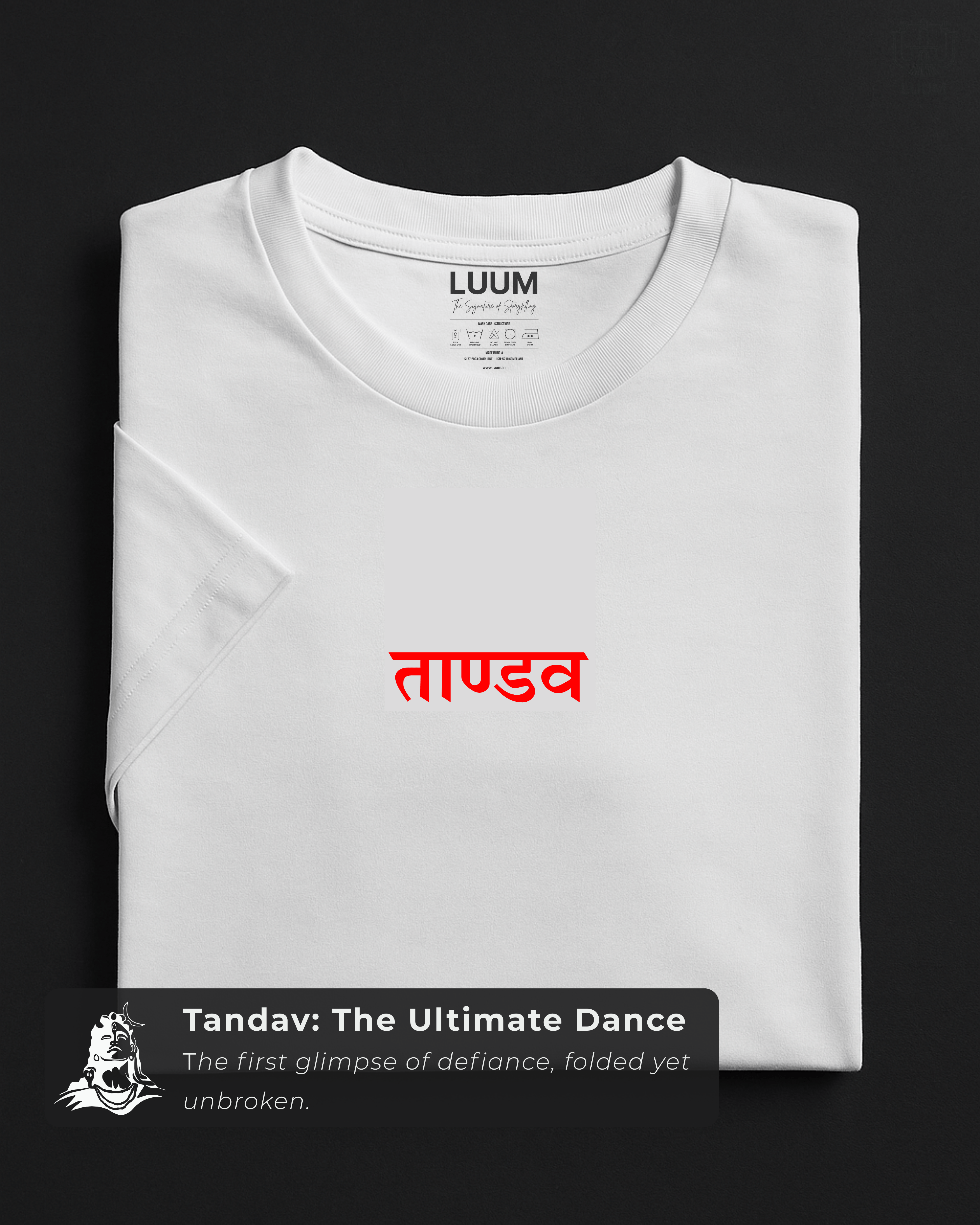 Folded white LUUM's Tandav t-shirt featuring bold red Sanskrit script, crafted in premium cotton. Part of Threadmark Collection. Belief. Woven and Worn.