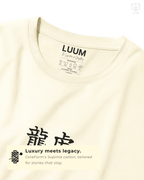 Closeup detail of LUUM’s Dreamer and the Doer t-shirt, highlighting ink strokes and Supima cotton texture. Part of Threadmark Collection. Belief. Woven and Worn.