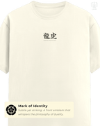 Front view of LUUM’s Dreamer and the Doer Supima cotton t-shirt showing minimal chest emblem. Part of Threadmark Collection. Belief. Woven and Worn.