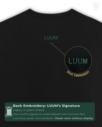 LUUM logo in green embroidery on the back of Ghost Mode tee. Part of Threadmark Collection. Belief. Woven and Worn.