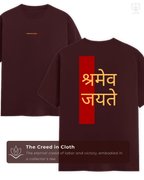 LUUM's Maroon Shramev Jayate T-shirt displayed flat, symbolizing endurance and victory through hard work. Part of Threadmark Collection. Belief. Woven and Worn.
