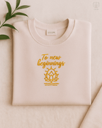 LUUM To New Beginnings embroidered Supima cotton tee in light baby pink with lotus design. Part of Threadmark Collection. Belief. Woven and Worn.